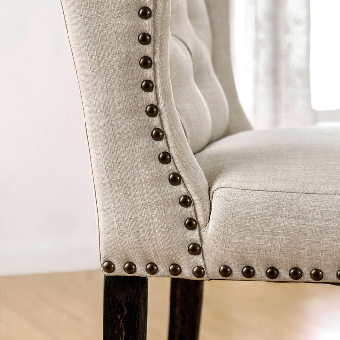 Side view close up ambrosia transitional beige fabric loveseat dining bench with detail of nailhead trim in a living room with accessories