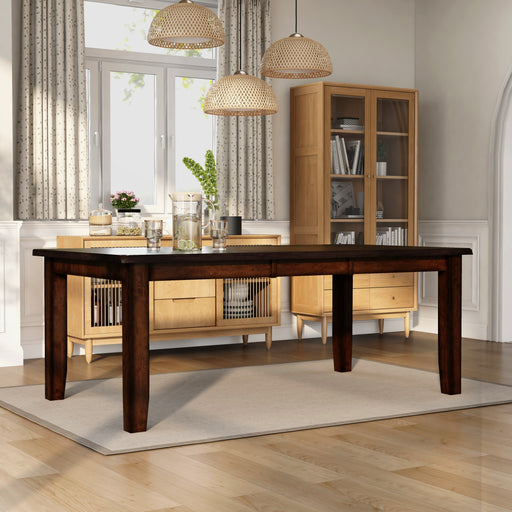 Right-angled rectangular wood dining table with tapered post legs in a casual dining room