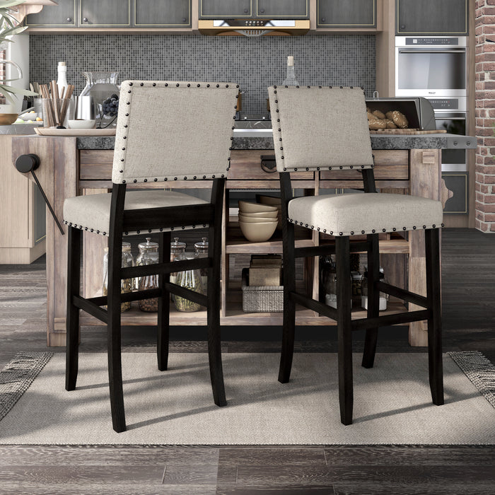 Beige linen-like fabric and antique black counter-height chair against with accessories. The square back and seat are accented with nailhead trim.