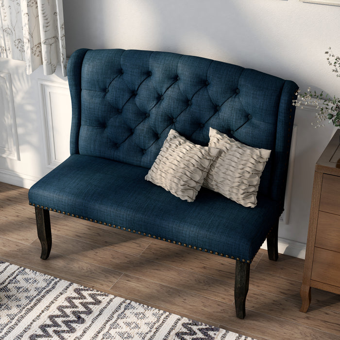Left-angled top view of ambrosia transitional blue nailhead trim fabric loveseat dining bench in a living room with accessories