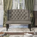 Front-facing ambrosia transitional light gray nailhead trim fabric loveseat dining bench in a living room with accessories