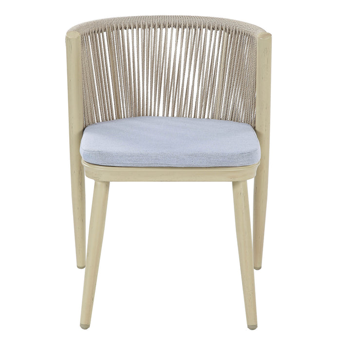 Front-facing transitional aluminum patio dining chair in natural tone finish displaying faux wicker rope backs and blue padded seat on a white background.
