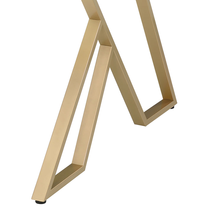 Left-angled close up modern glam dining table geometric base in gold on a white background