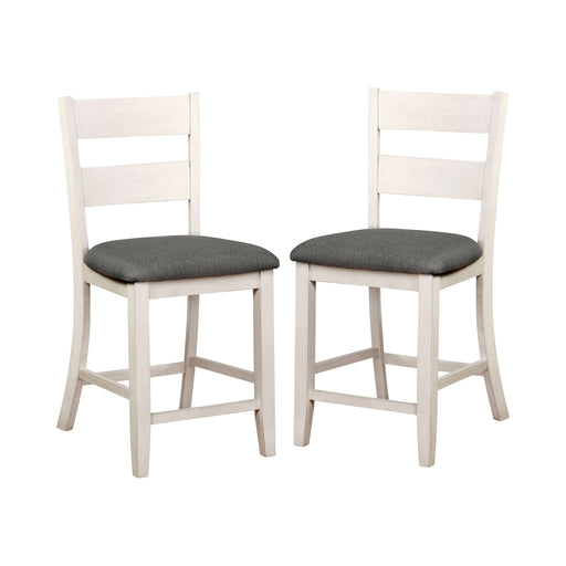 Right and left angled rustic set of two counter height chairs in antique white on a white background