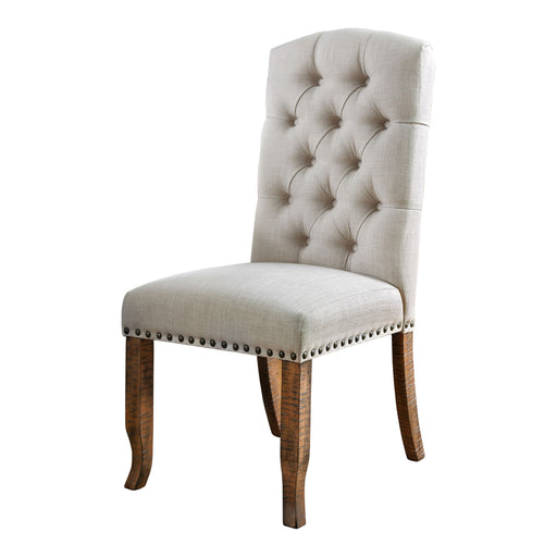 Left angled rustic pine and ivory button tufted dining chair on a white background