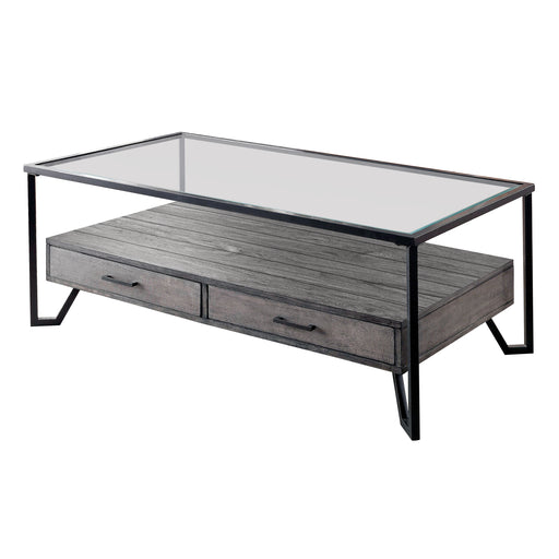 Left angled industrial two-drawer coffee table on a white background. Glass top and spacious lower shelf with plank details rests on a black angled metal frame.