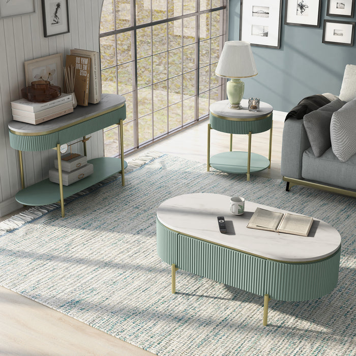 Top-down glam light teal fluted coffee table, end table and sofa table with rounded faux white marble tops and gold accents with accessories in a living room. 