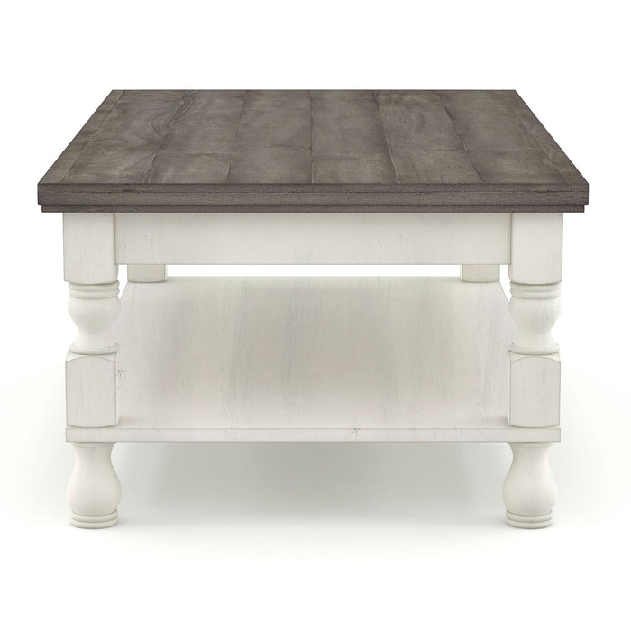 Front facing side view of a transitional one-shelf antique white and gray wood coffee table on a white background