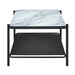 Side-facing modern industrial black steel coffee table with tempered white marble glass top and perforated open metal shelf on a white background.