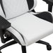 Right angled close up modern black and white faux leather gaming chair seat detail on a white background