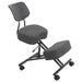 Right angled modern gray ergonomic kneeling chair with wheels on a white background