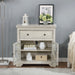 Front facing traditional antique white one-drawer hallway cabinet with glass doors open in a living area with accessories
