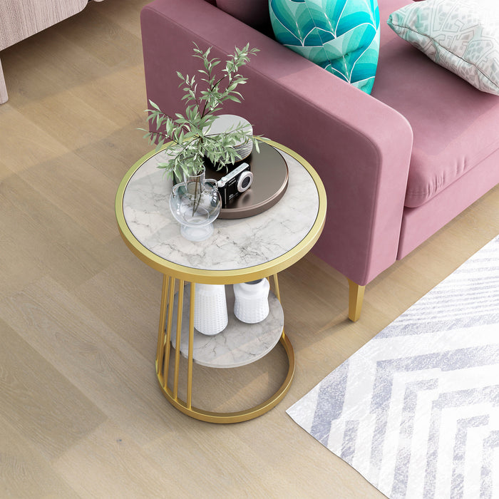 Right angled top view of a contemporary white faux marble and gold one-shelf round side table in a living room with accessories