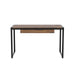 Front-facing view of contemporary sand black and natural tone steel and particle board writing desk on white background