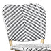 Detail shot of a black and white chevron patterned wicker curved backrest.