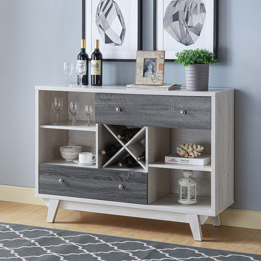 Angled view of mid-century modern distressed gray and white oak finish buffet server with storage in living space with accessories
