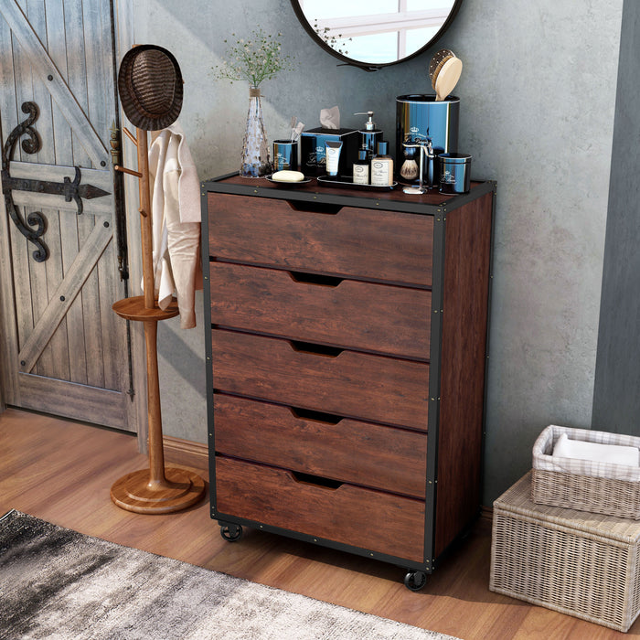 Left-angled vintage walnut 5-drawer chest in a rustic bedroom. A tissue box, lotions, and cosmetics sit on the rustic plank-style paneling.