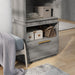 Left angled close up drawer and shelf of amoire with mirror in a vintage gray oak finish in a room with accessories