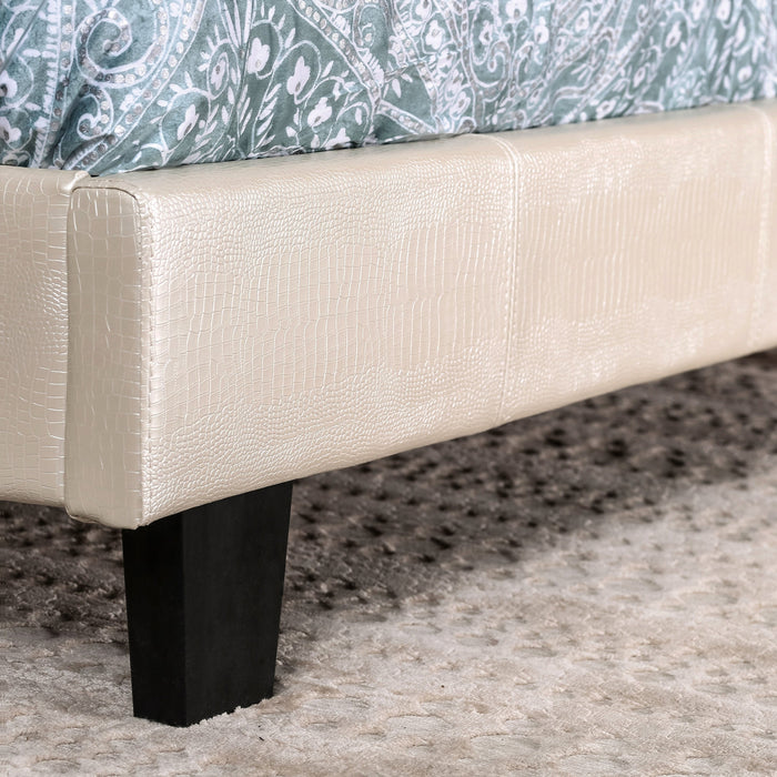 Right-angled, detail shot of the pearl white faux crocodile leather queen footboard in a contemporary bedroom.