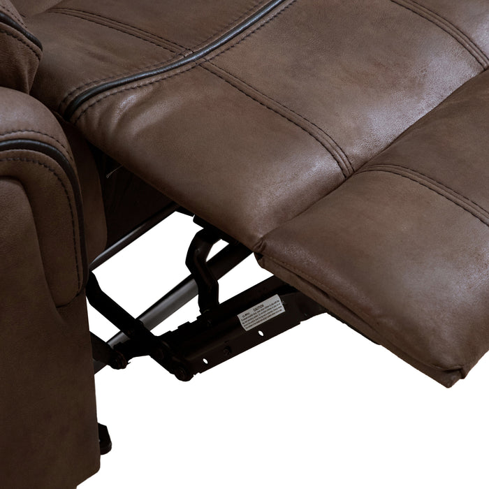 Right facing close up of the raised leg rest of a transitional brown microfiber recliner with accent stitching on a white background