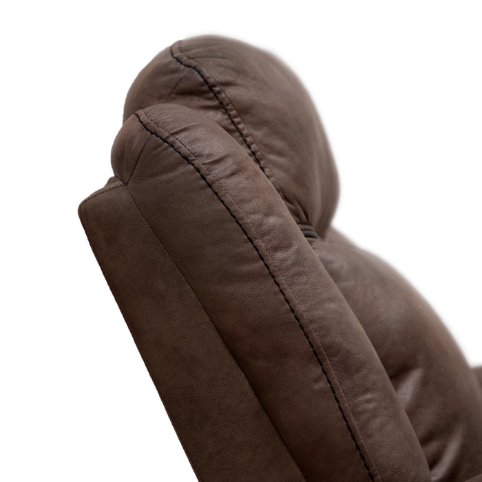 Front facing side view close up of the backrest of a transitional brown microfiber recliner with accent stitching on a white background