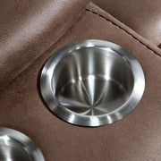 Right facing close up of the cupholders of a transitional brown microfiber reclining loveseat with console and accent stitching on a white background
