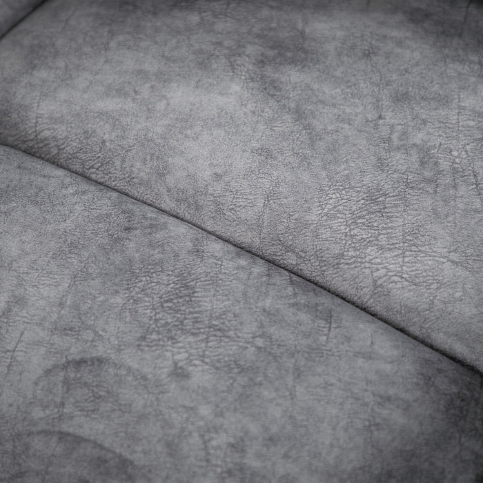 Close up of the upholstery fabric of a transitional grey microfiber recliner with accent piping