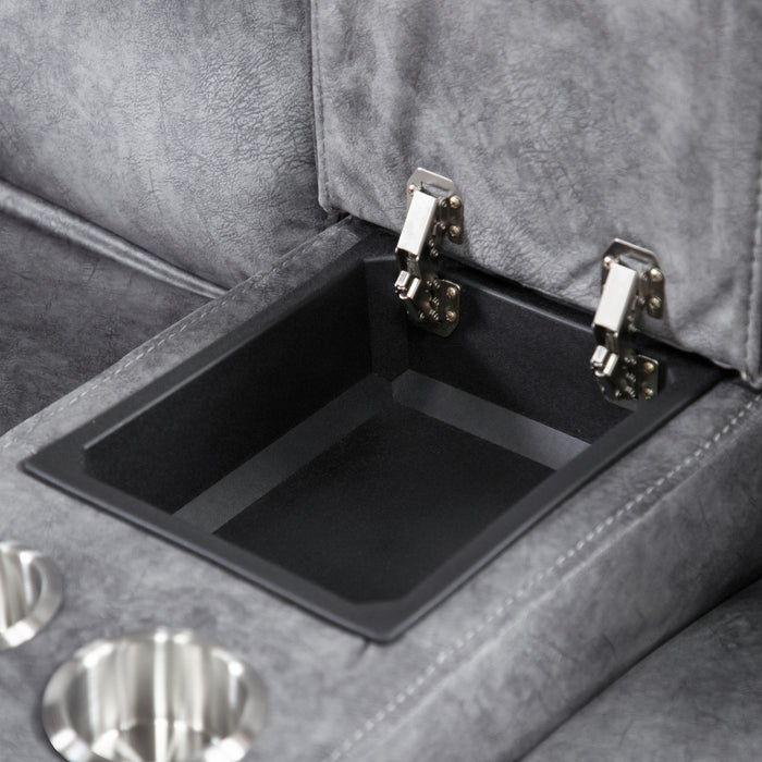 Left facing close up of the open storage console of a transitional grey microfiber loveseat with console and accent piping