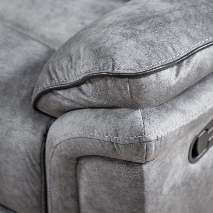 Left facing close up of the armrest of a transitional grey microfiber loveseat with console and accent piping