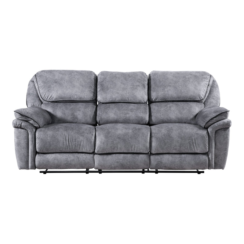 Front facing transitional grey microfiber sofa with accent piping fully reclined on a white background
