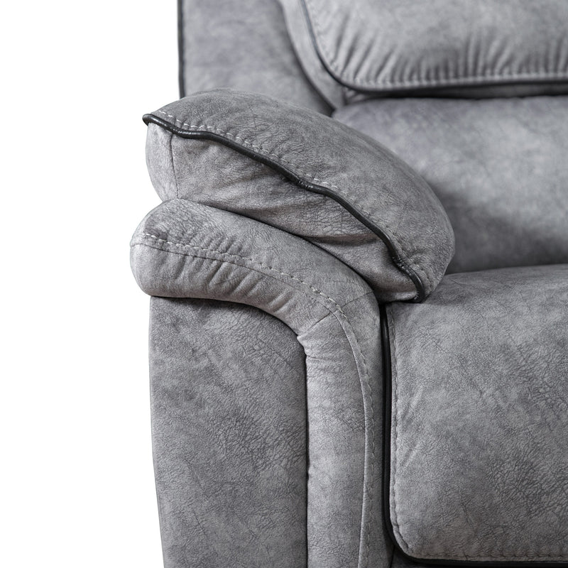 Front facing close up of the armrest of a transitional grey microfiber sofa with accent piping on a white background