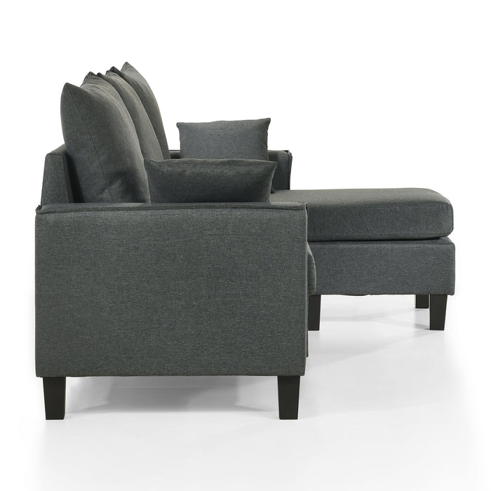Front facing side view of a transitional dark grey customizable sectional sofa on a white background