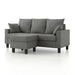 Left facing contemporary grey sectional sofa with an adjustable ottoman on a white background