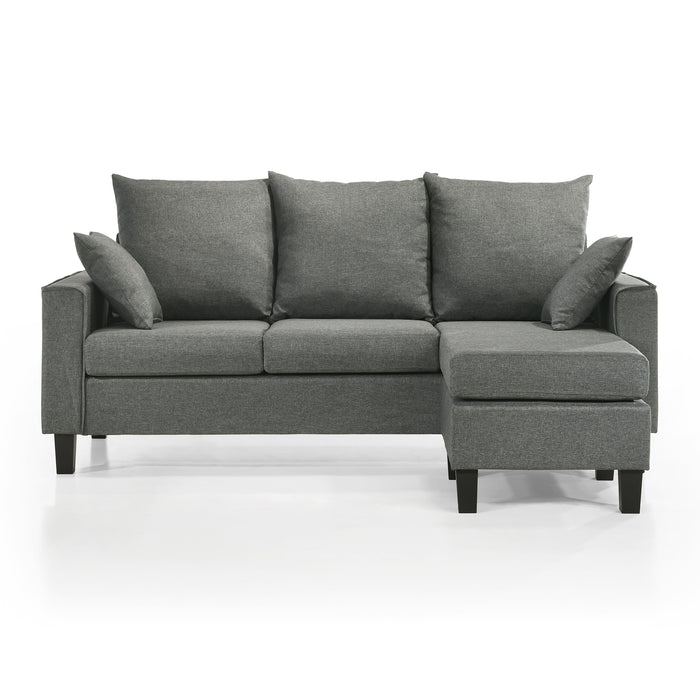 Front facing contemporary grey sectional sofa with an adjustable ottoman on a white background