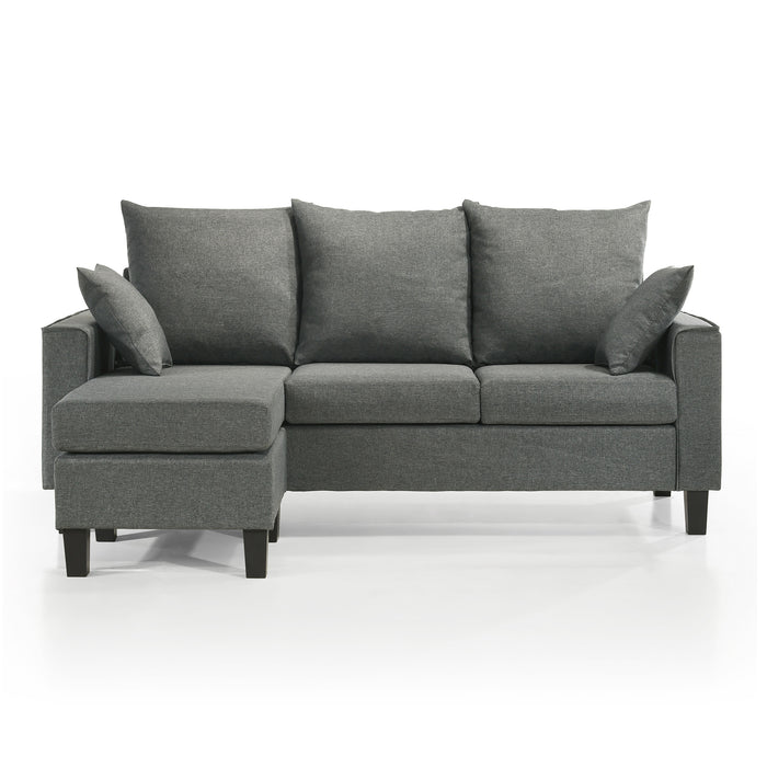 Front facing contemporary grey sectional sofa with an adjustable ottoman on a white background