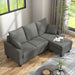 Bird's eye view of a right facing contemporary grey sectional sofa with an adjustable ottoman in a living room with accessories