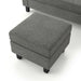 Close up view of the detached ottoman of a contemporary grey sectional sofa with an adjustable ottoman on a white background