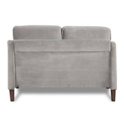 Front facing back view of a modern grey velvet loveseat with sloping arms on a white background
