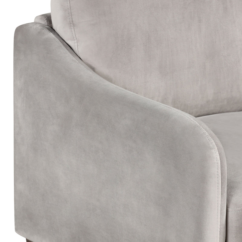 Right facing close up of the leg on a modern grey velvet loveseat with sloping arms on a white background