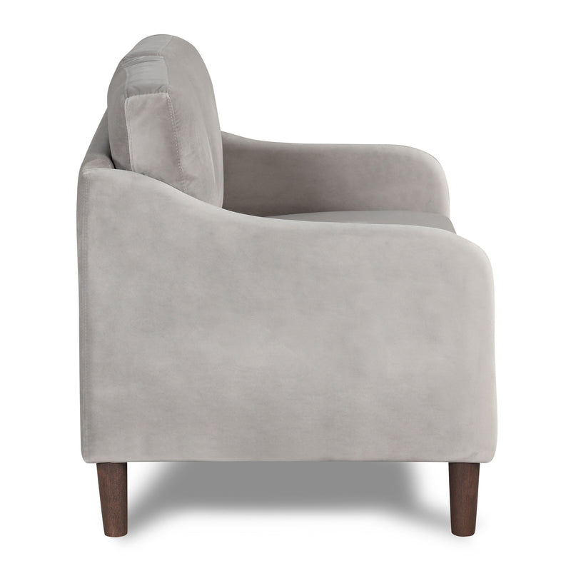 Front facing side view of a modern grey velvet loveseat with sloping arms on a white background