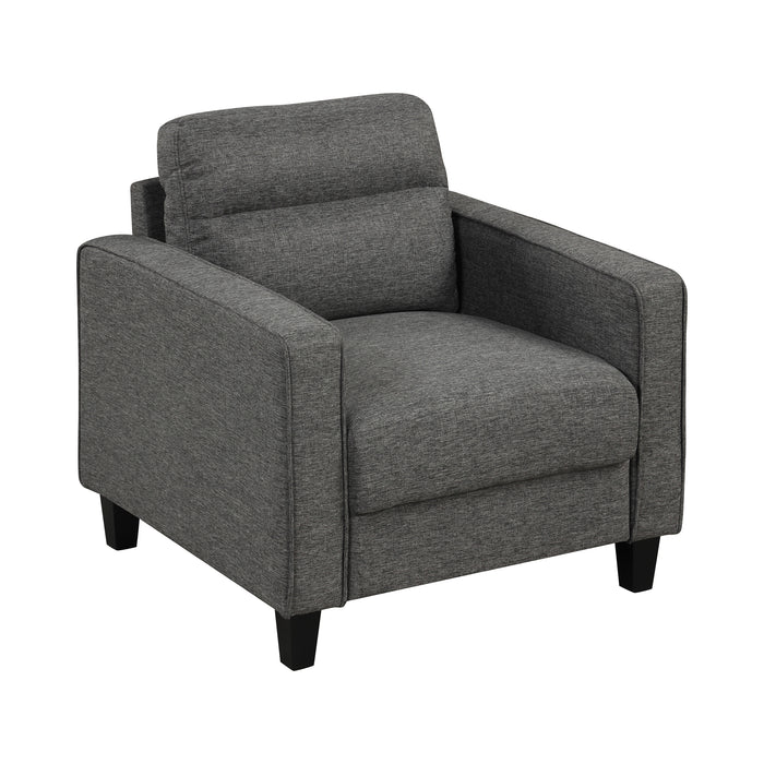 Right facing transitional grey linen-look accent armchair on a white background