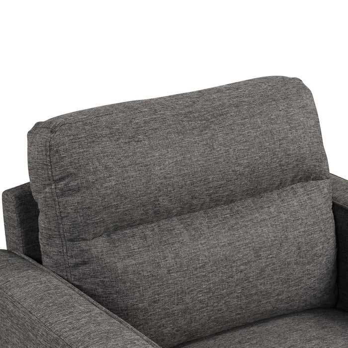 Right facing close up of the back cushion of a transitional grey linen-look accent armchair on a white background