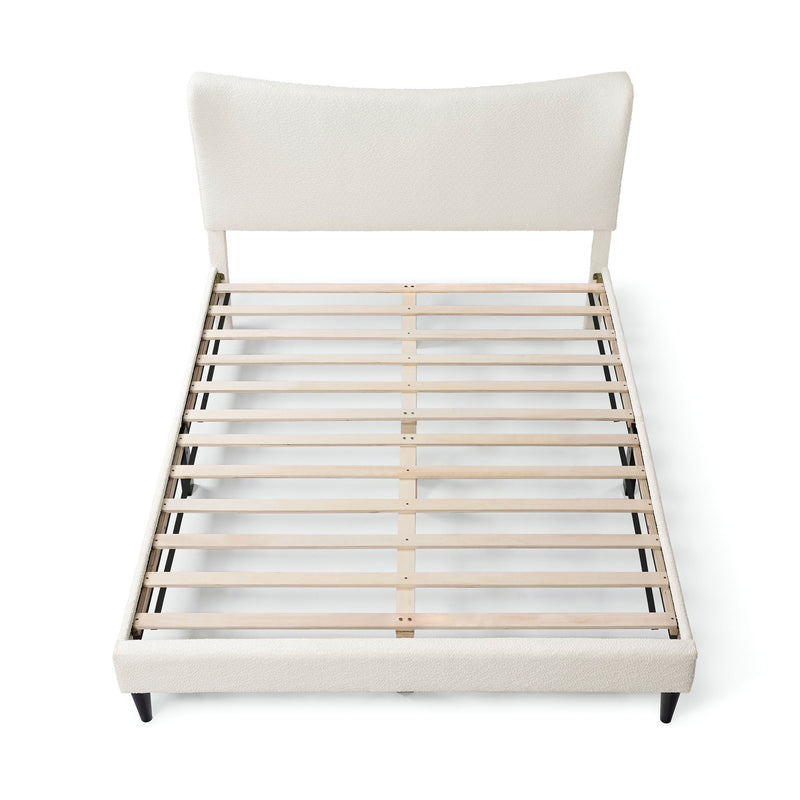 Front facing high-camera view of a modern white boucle upholstered queen bed on a white background