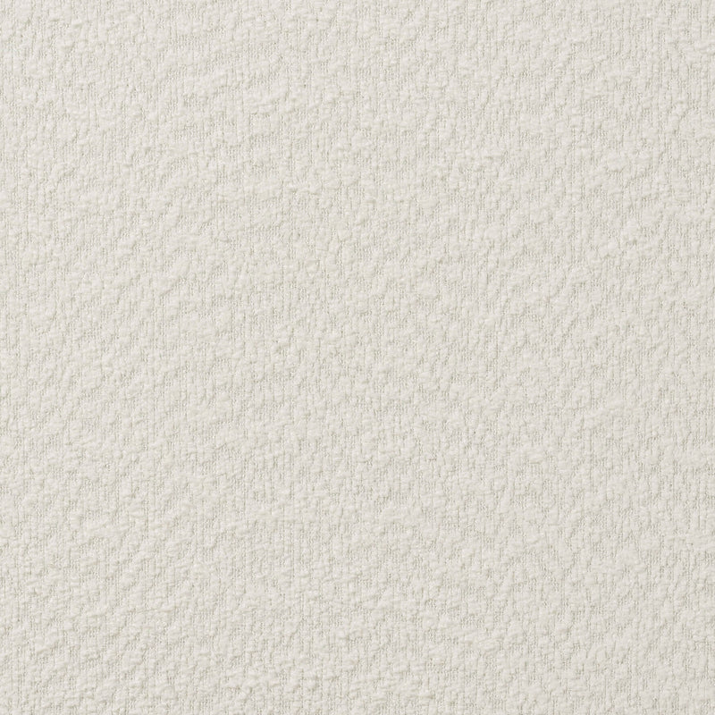 Close up swatch of the white boucle upholstery featured on a modern white boucle upholstered queen bed