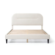 Front facing modern white boucle upholstered queen bed on a white background