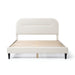 Front facing modern white boucle upholstered queen bed on a white background