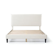 Front facing modern white boucle upholstered queen bed on a white background