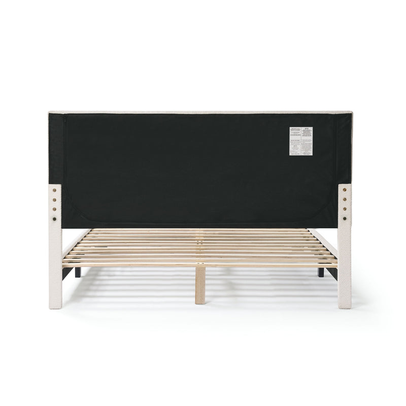 Front facing back view of a modern white boucle upholstered queen bed on a white background