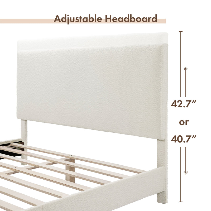 Left facing close up of a modern white boucle upholstered queen bed that highlights its adjustable height headboard