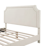 Left facing close up of the headboard of a modern white boucle upholstered queen bed on a white background